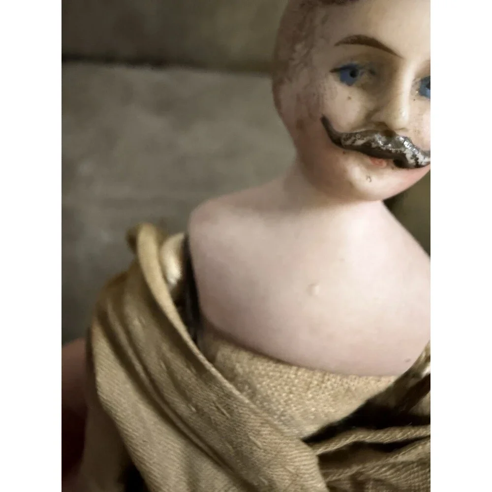 Antique German bisque gentleman doll, approximately 7 inches tall,